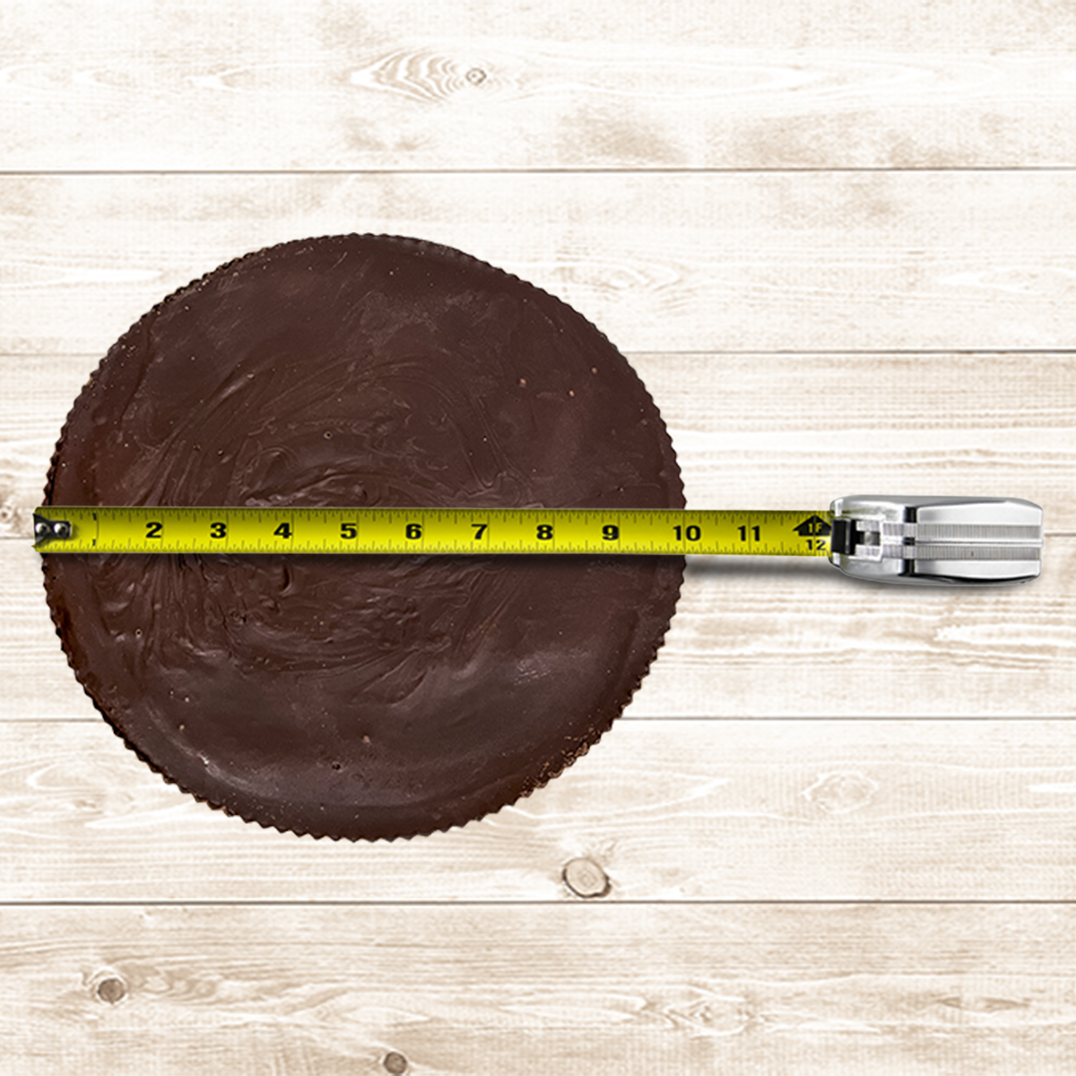 Measuring the giant peanut butter cup