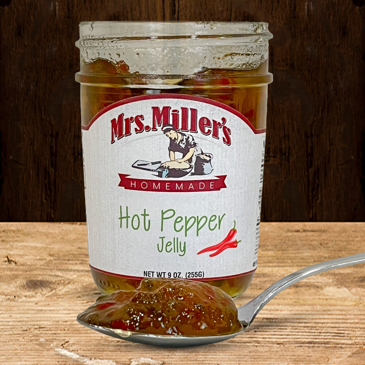 View of an open jar with a spoonful of product in front of it